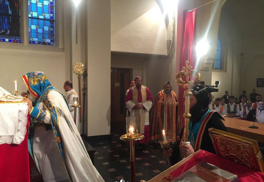 His Holiness Patriarch celebrated the Holy Qurobo at St. Mary Church in Liege.